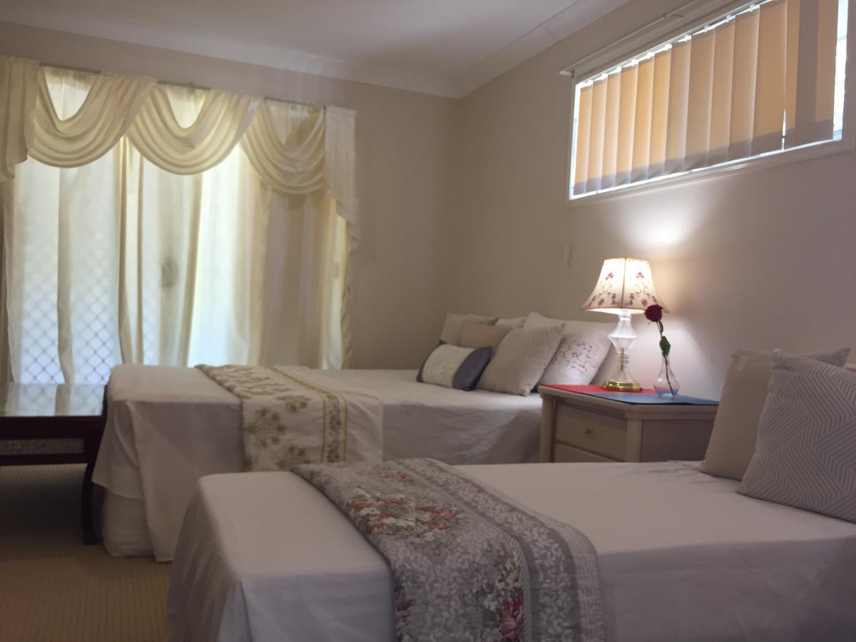 Theme Parks Amituofo Homestay Gold Coast Zimmer foto