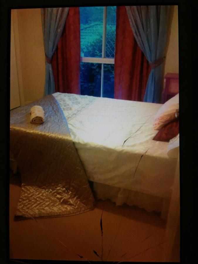 Theme Parks Amituofo Homestay Gold Coast Zimmer foto